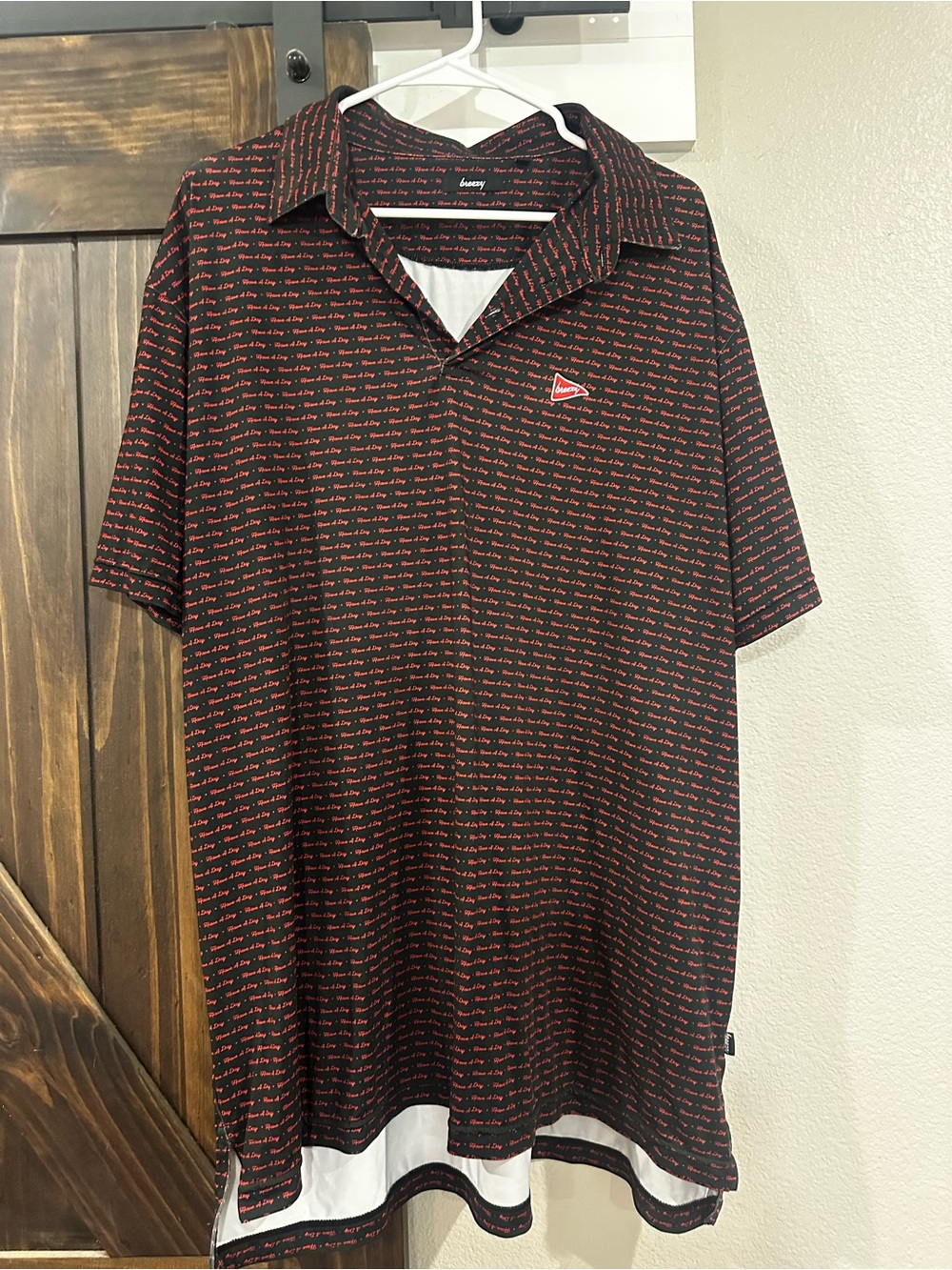Short-Sleeve Black Polo with Red Script Print
